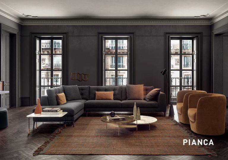 Salón contemporáneo con sofá amplio de diseño, cojines en tonos neutros, mesa de centro y decoración moderna en un espacio luminoso y equilibrado